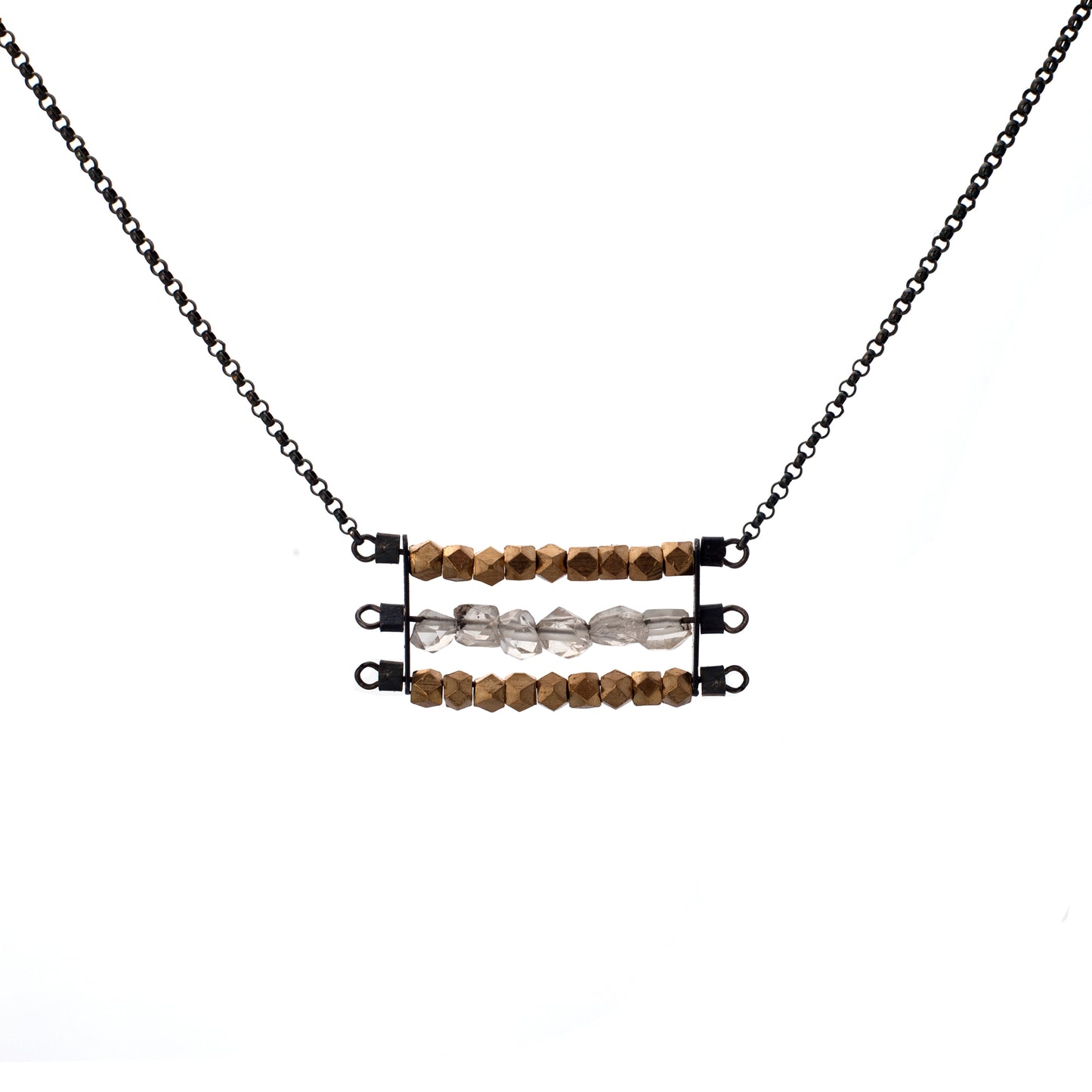 Abacus necklace with two rows of faceted brass beads and one row of clear Herkimer Diamonds, suspended horizontally on black oxidized sterling silver rungs, hanging from a black oxidized sterling silver chain. Approximately 17" in length.