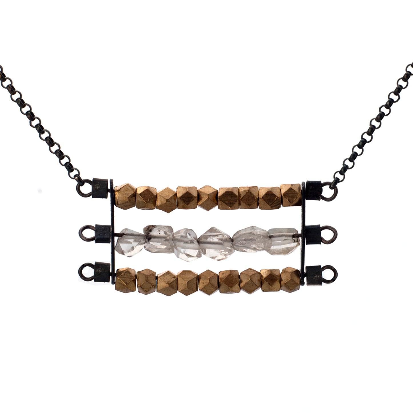 Abacus necklace with two rows of faceted brass beads and one row of clear Herkimer Diamonds, suspended horizontally on black oxidized sterling silver rungs, hanging from a black oxidized sterling silver chain. Approximately 17" in length.